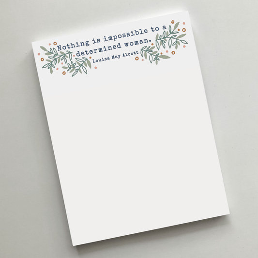 "Nothing Is impossible to a determined woman" Notepad